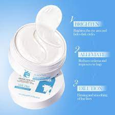 Morning routine flatlay with eye masks, moisturizer, and sunrise lighting.