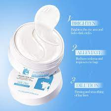 Morning routine flatlay with eye masks, moisturizer, and sunrise lighting.